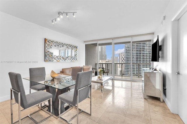 dining area featuring expansive windows