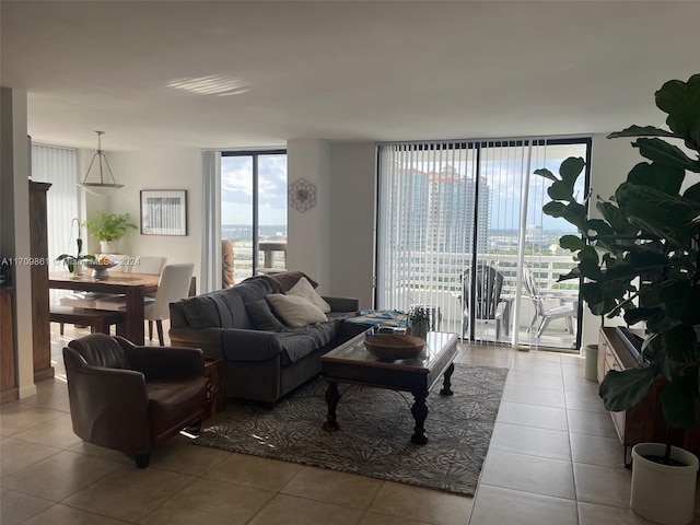 tiled living room featuring expansive windows