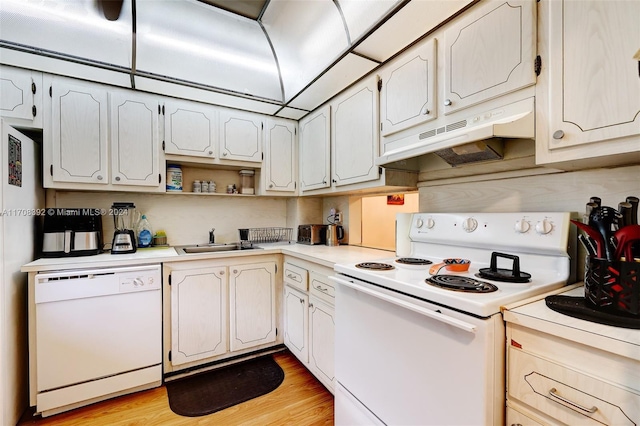 kitchen with white cabinetry, light wood-type flooring, white appliances, and sink