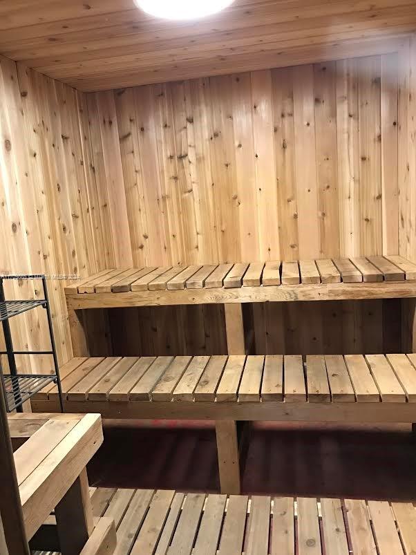 view of sauna featuring hardwood / wood-style floors