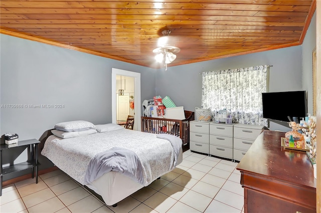 bedroom featuring ceiling fan, wooden ceiling, ornamental molding, and light tile patterned floors