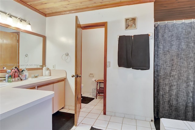 bathroom with tile patterned floors, ornamental molding, wood ceiling, a shower with curtain, and vanity