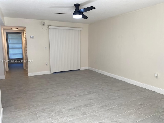 unfurnished bedroom with ceiling fan