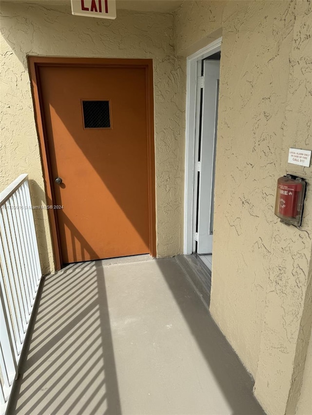 doorway to property with a balcony