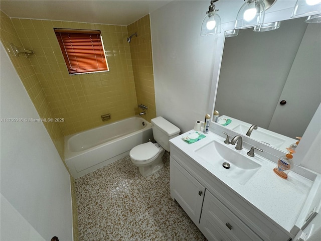 bathroom with toilet, tub / shower combination, and vanity