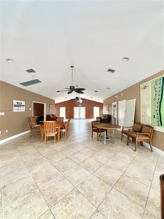 dining area featuring vaulted ceiling and ceiling fan