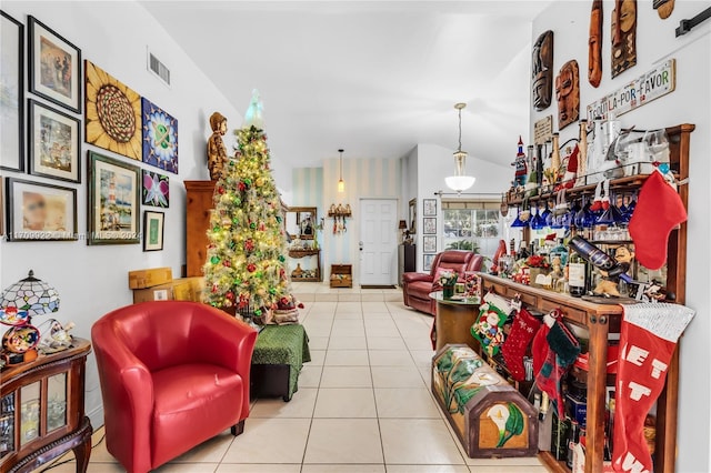 tiled living room with bar area and lofted ceiling