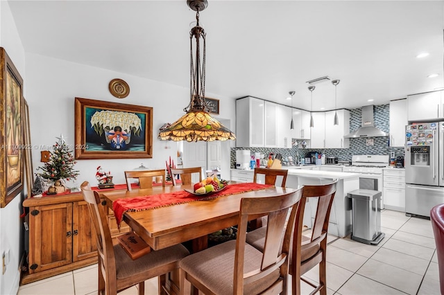 dining area with light tile patterned flooring