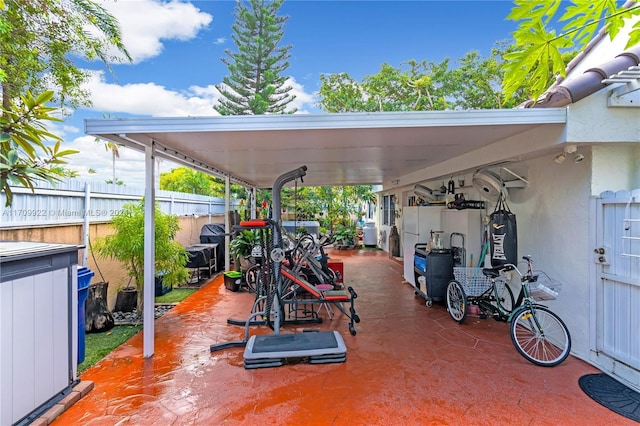 exterior space featuring a carport