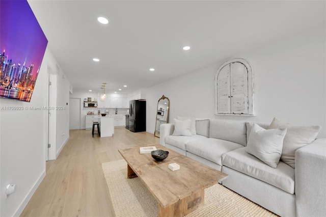 living room featuring light hardwood / wood-style floors