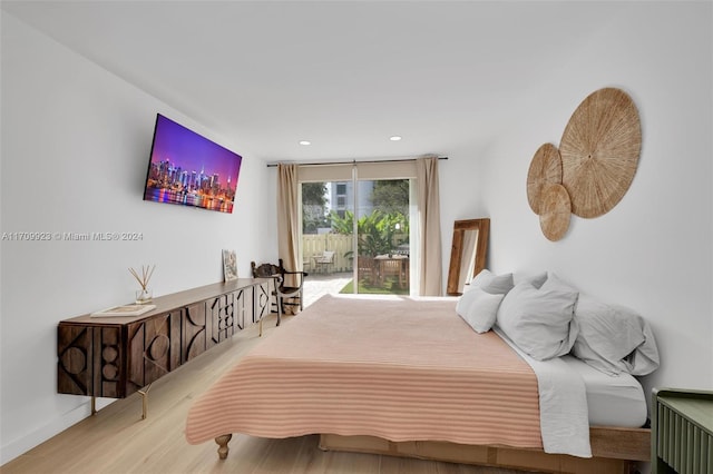 bedroom featuring wood-type flooring