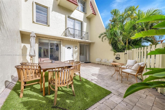 view of patio / terrace with a balcony