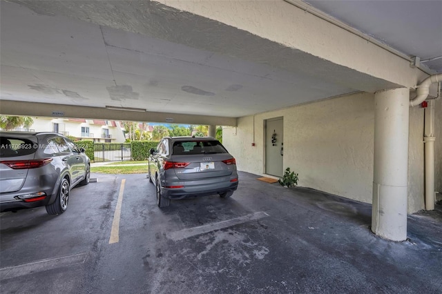 garage with a carport