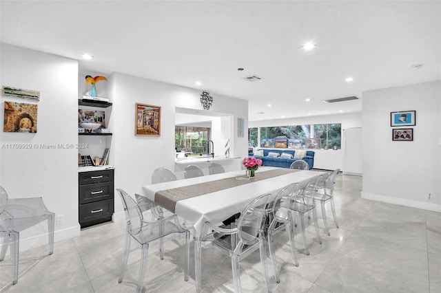 dining space featuring a healthy amount of sunlight