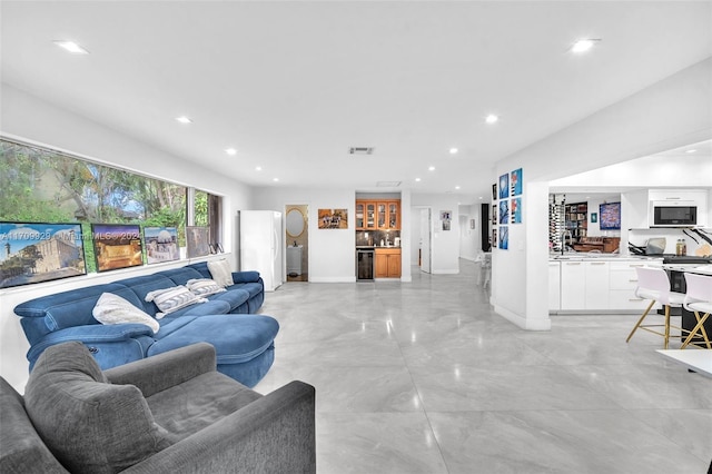 living room featuring beverage cooler