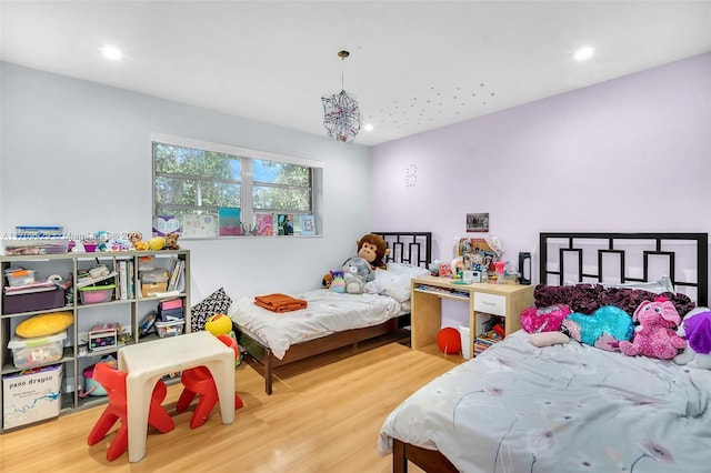 bedroom featuring wood-type flooring