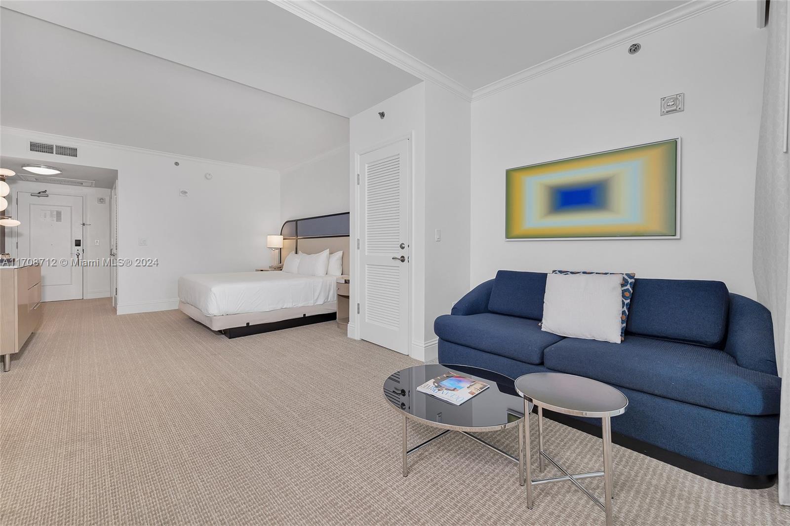 bedroom featuring carpet floors and ornamental molding