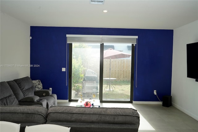 living room featuring tile patterned flooring