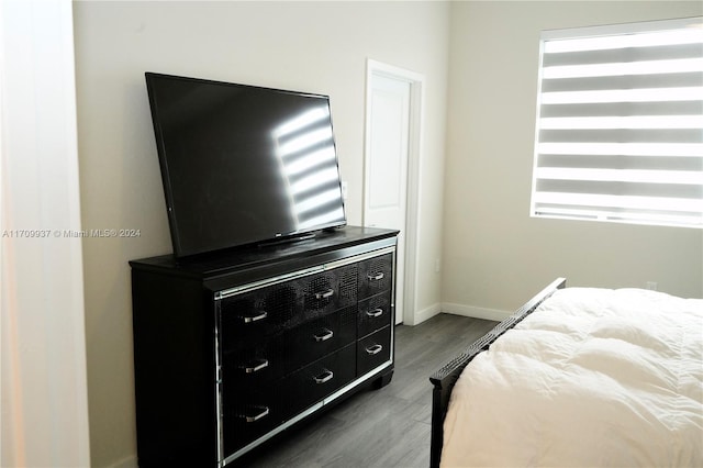 bedroom featuring dark hardwood / wood-style floors