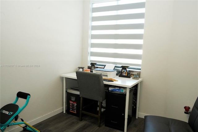 office space with dark hardwood / wood-style flooring