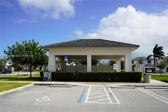 view of parking / parking lot with mail boxes