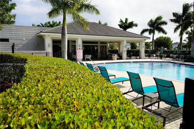 view of pool featuring a patio area