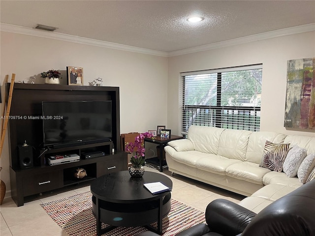 tiled living room with a textured ceiling and ornamental molding