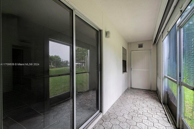 view of unfurnished sunroom