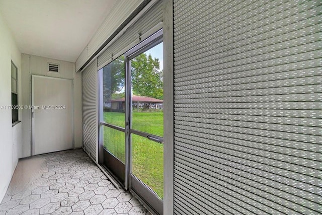 view of unfurnished sunroom