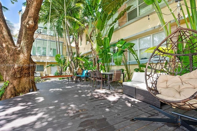 1446 Lenox Ave Unit 2, Miami Beach, FL 33139 - wooden terrace with an outdoor living space