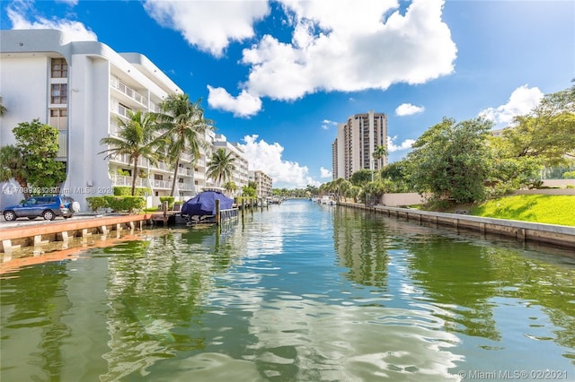 property view of water featuring a boat dock