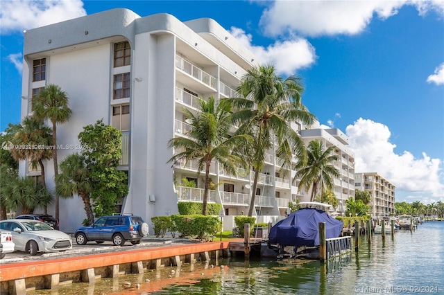 view of building exterior featuring a water view