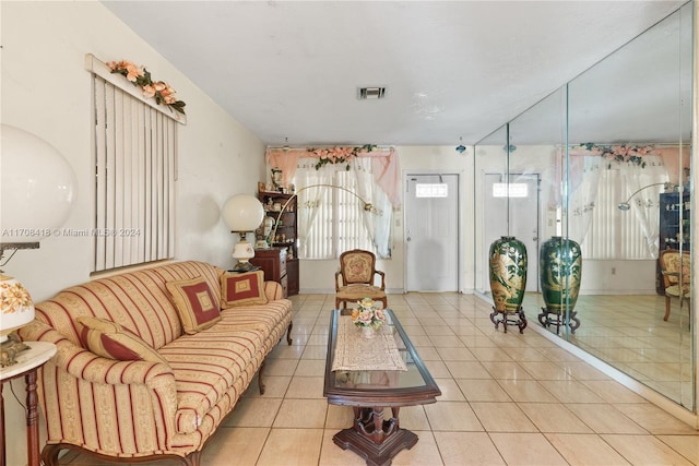 living room with light tile patterned floors