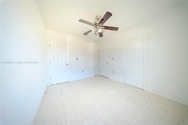 spare room with ceiling fan