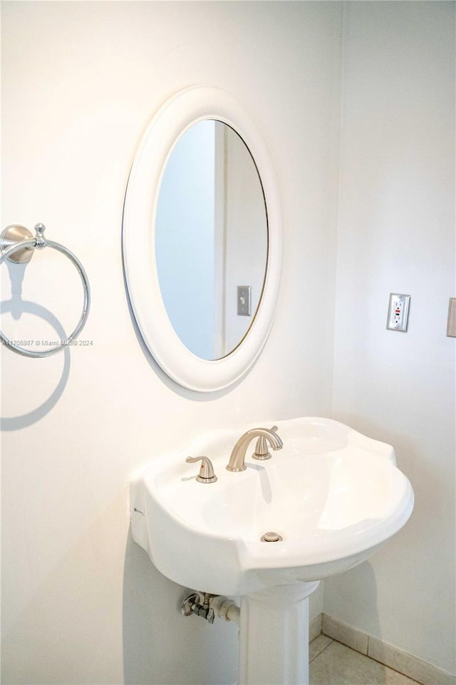 bathroom featuring tile patterned floors and sink