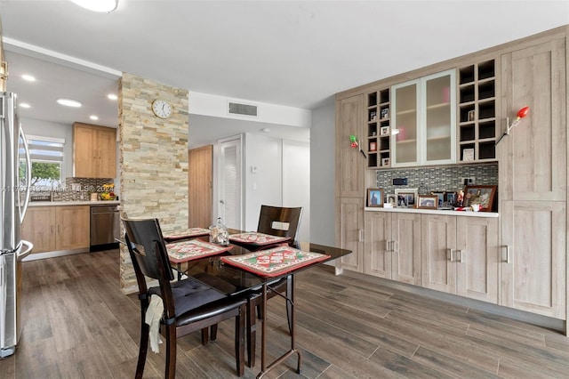 dining room featuring dark hardwood / wood-style floors