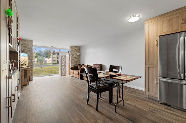 dining space with dark wood-type flooring