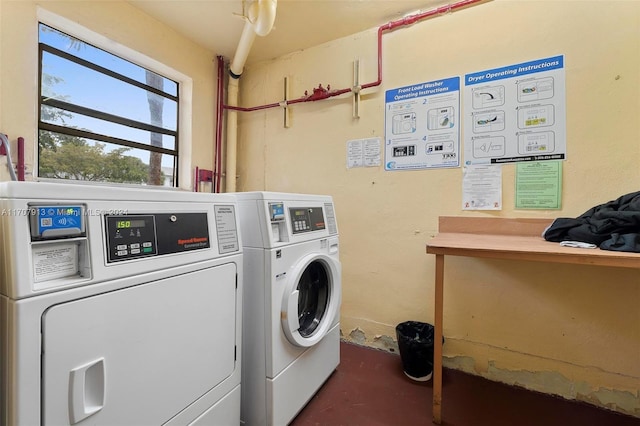 washroom with separate washer and dryer