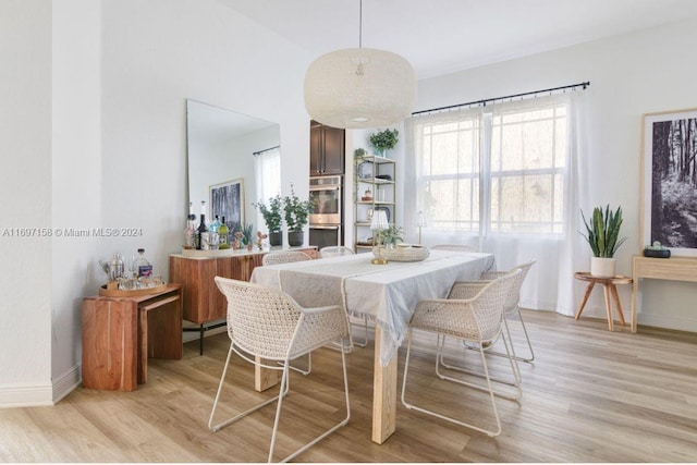 dining room with light wood-type flooring