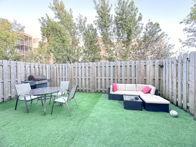 view of patio featuring an outdoor hangout area and a grill