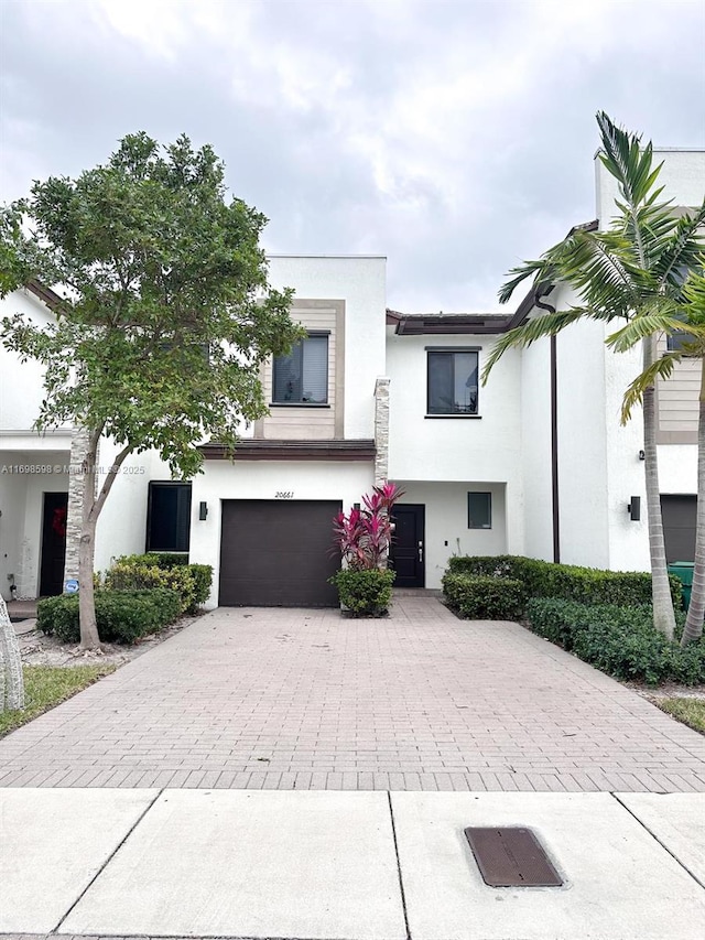 view of front of property with a garage