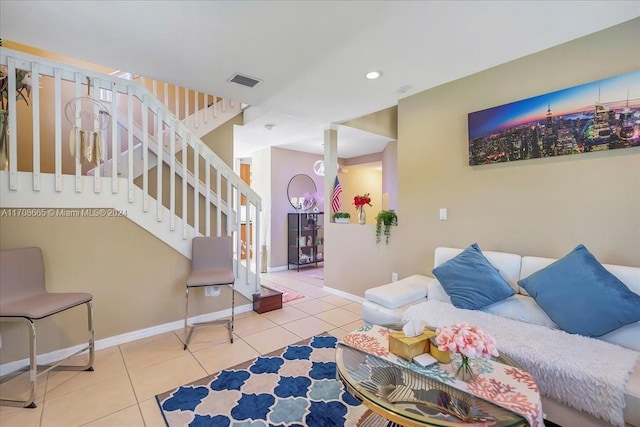 living room with light tile patterned floors