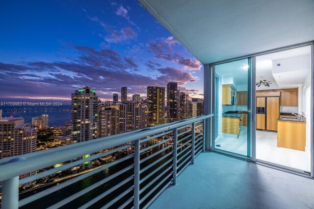 335 S Biscayne Blvd Unit 4109, Miami, FL 33131 - balcony at dusk with a view of city