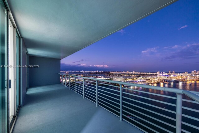 335 S Biscayne Blvd Unit 4109, Miami, FL 33131 - balcony at dusk featuring a city view