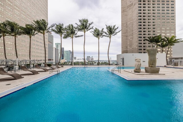 335 S Biscayne Blvd Unit 4109, Miami, FL 33131 - pool featuring a patio, a view of city, and fence