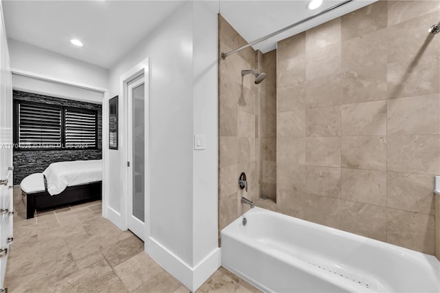 bathroom featuring tiled shower / bath combo