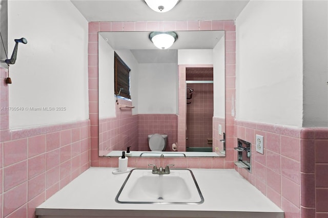 201 Entrada Dr, Hollywood, FL 33021 - bathroom featuring tile walls, vanity, toilet, and tiled shower