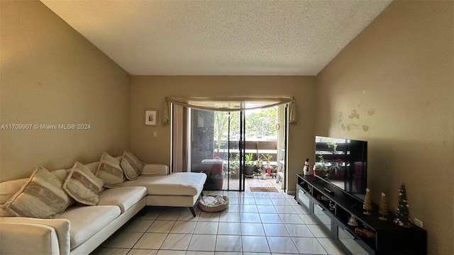 tiled living room with a textured ceiling