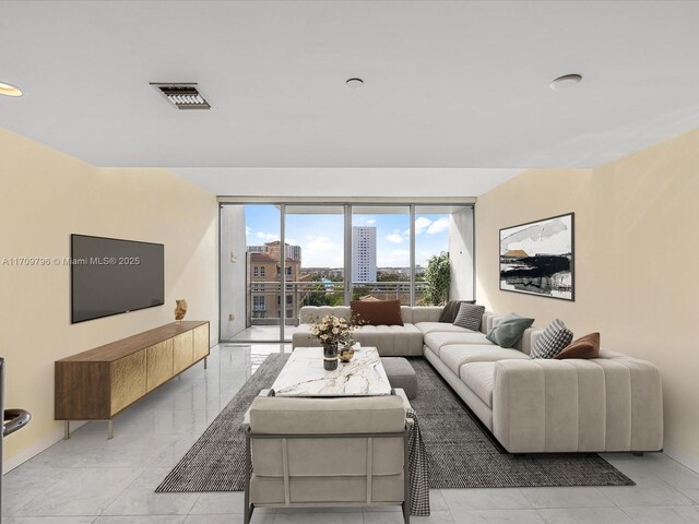 living room featuring concrete floors