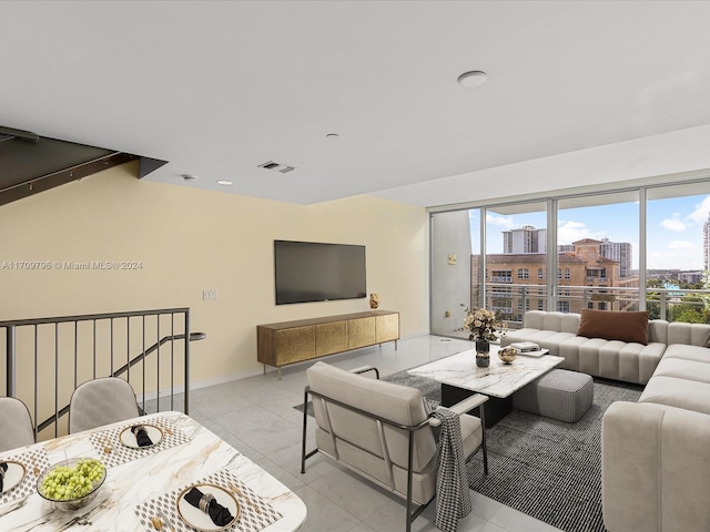 living room with light tile patterned floors